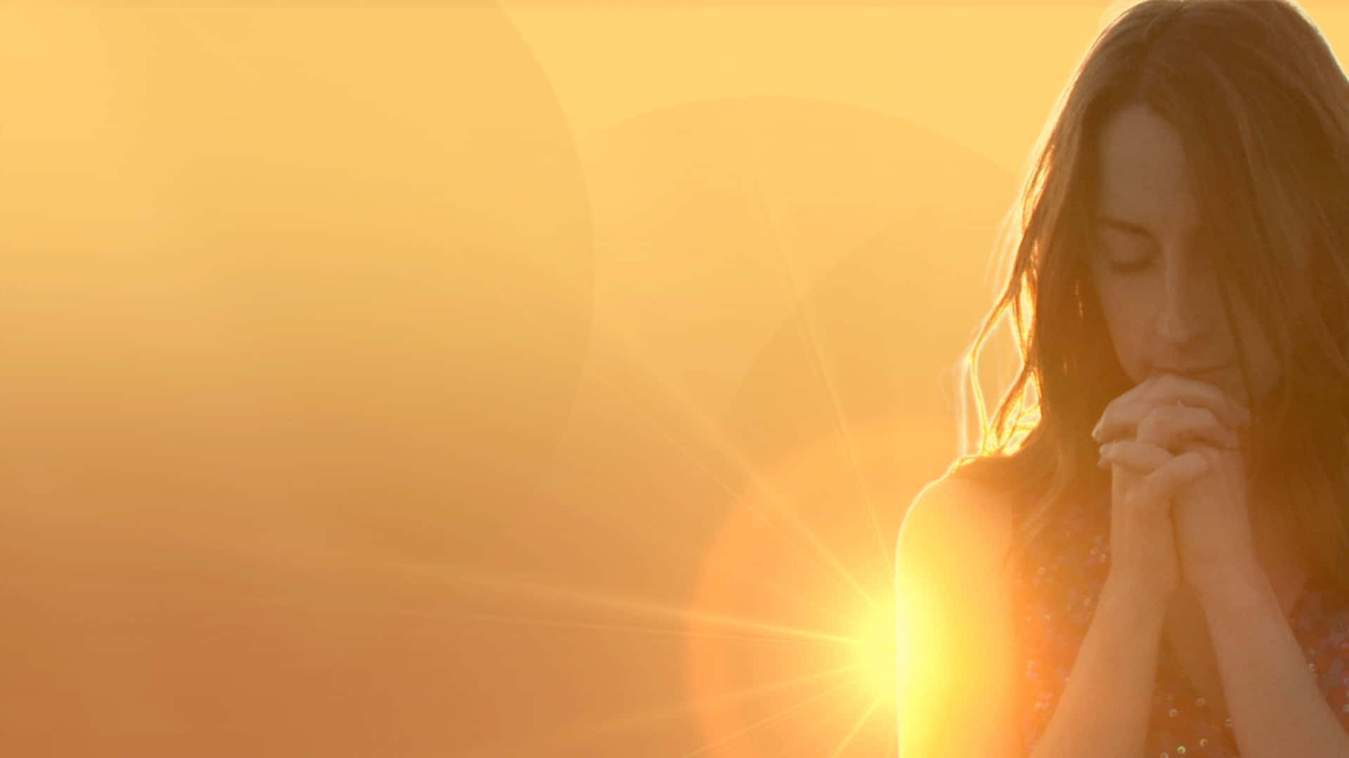 Woman Praying Golden Sunset Shot Wallpaper