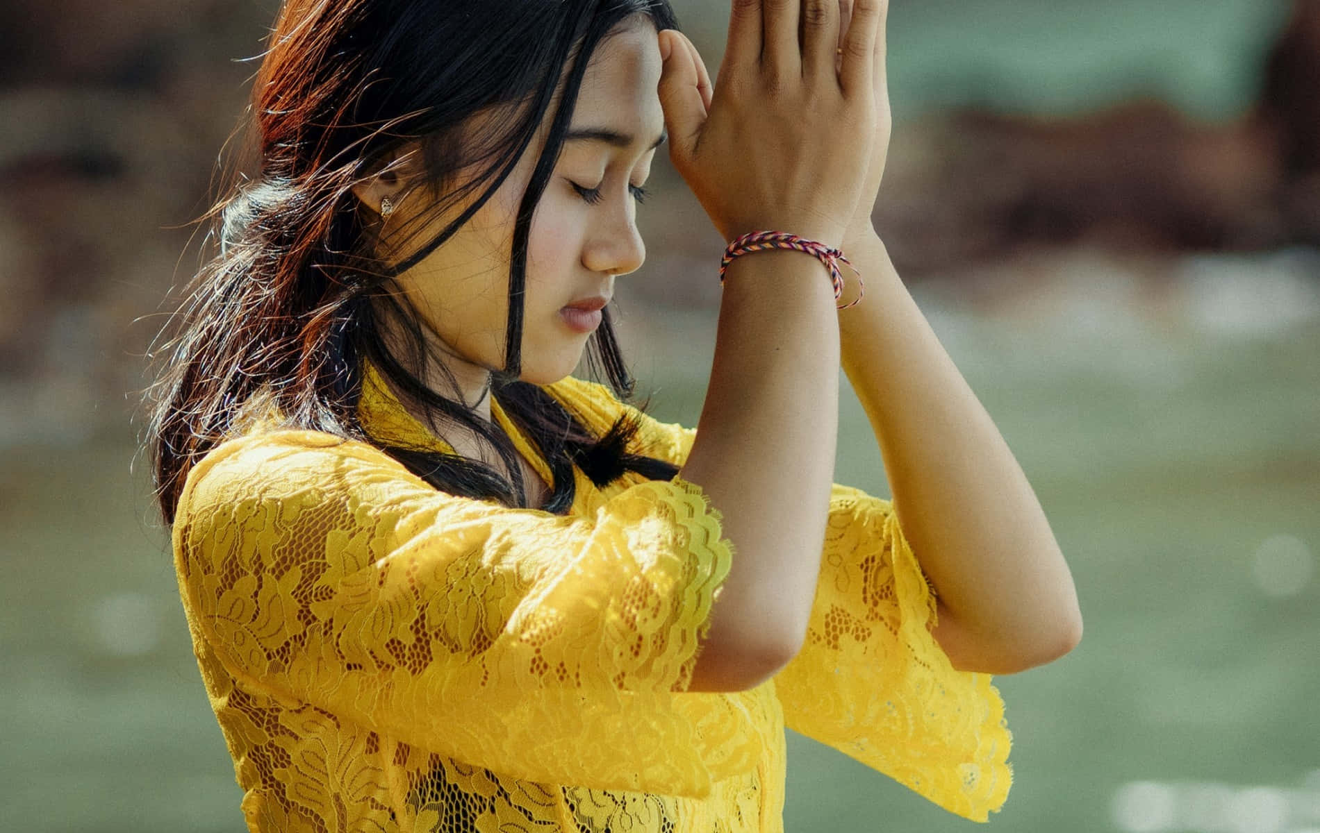 Woman Praying In The River Wallpaper