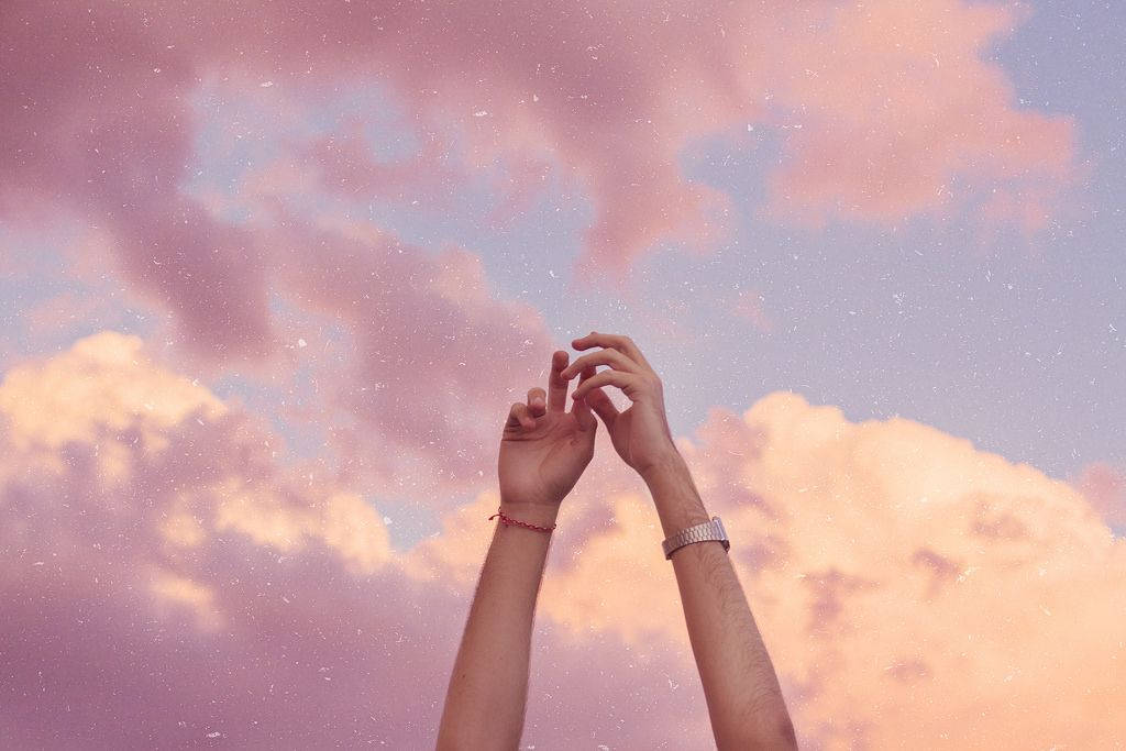 Woman's Hands Under Pink Sky Pfp Aesthetic Wallpaper