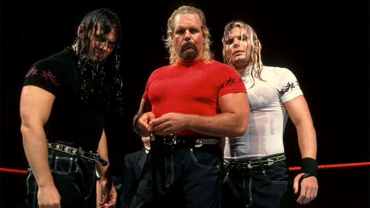 Wrestling_ Trio_ In_ The_ Ring Wallpaper