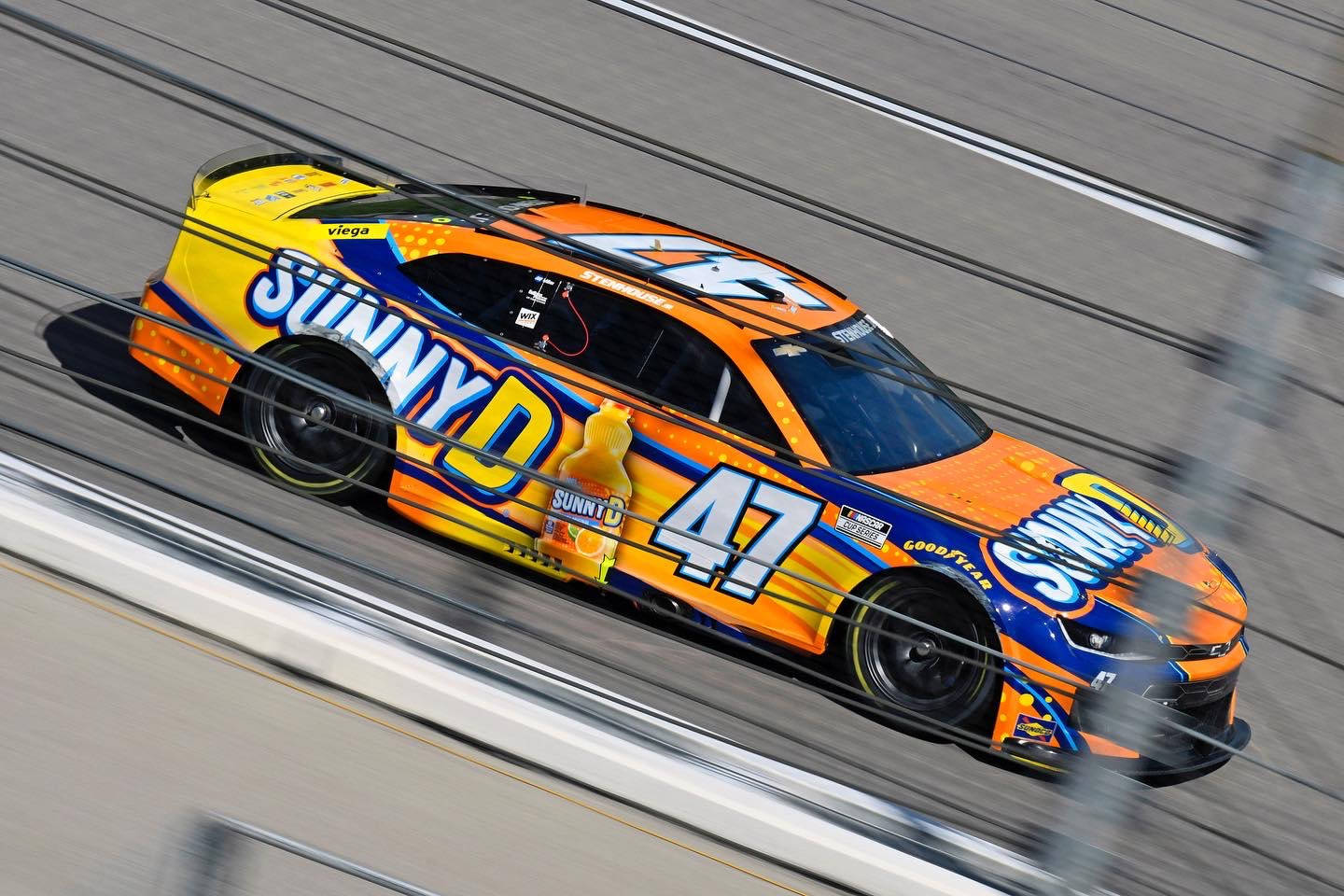 Yellow Ricky Stenhouse Jr. Race Car Wallpaper