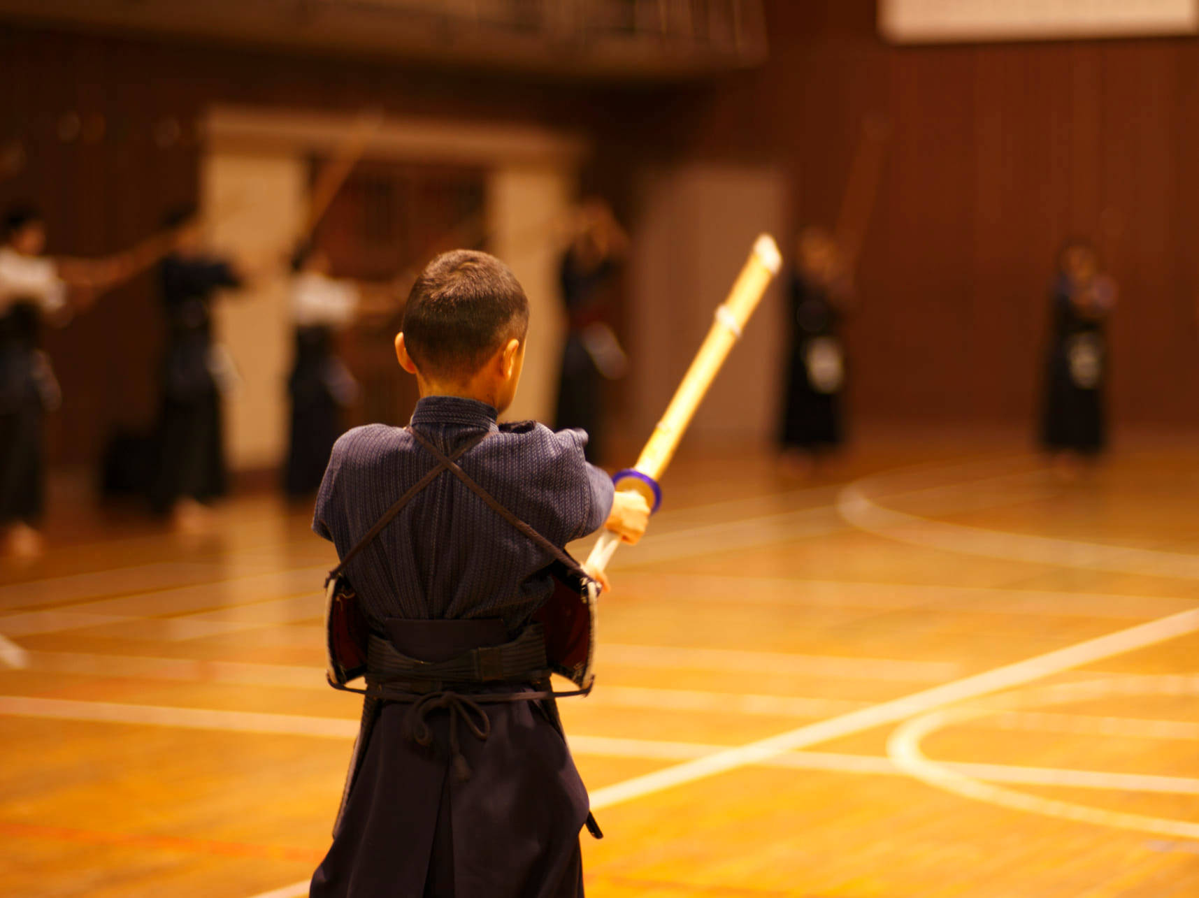 Young Child Mastering The Art Of Kendo Wallpaper