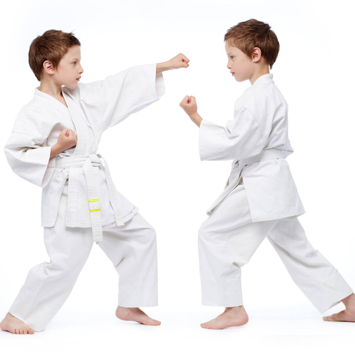 Young Karate Kids In Action Wallpaper