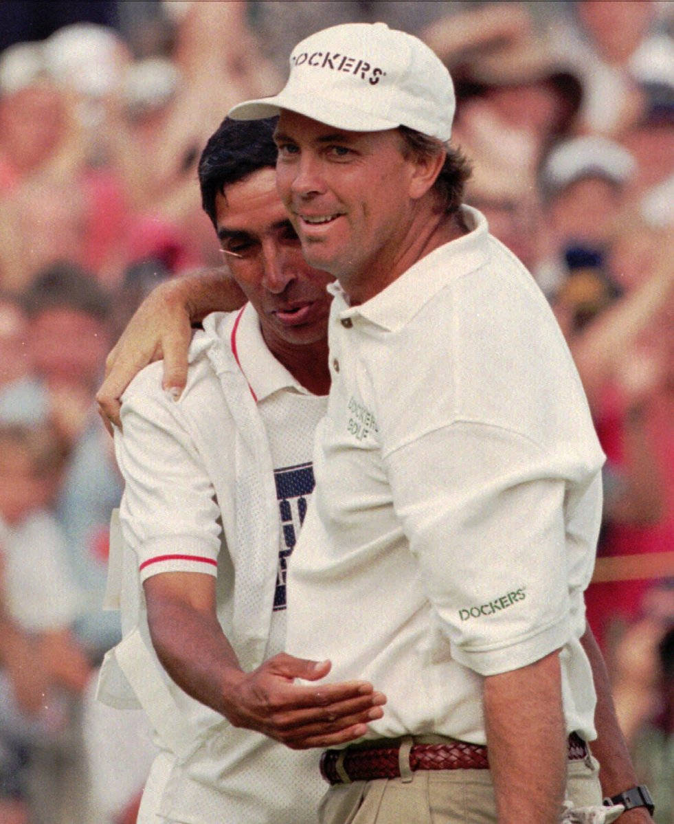 Young Tom Lehman Hugging Someone Wallpaper