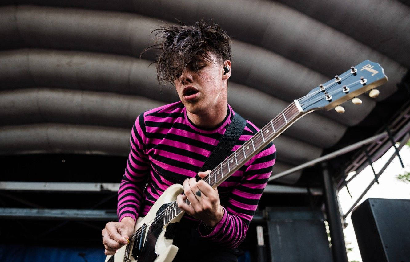 Yungblud Playing Guitar Wallpaper