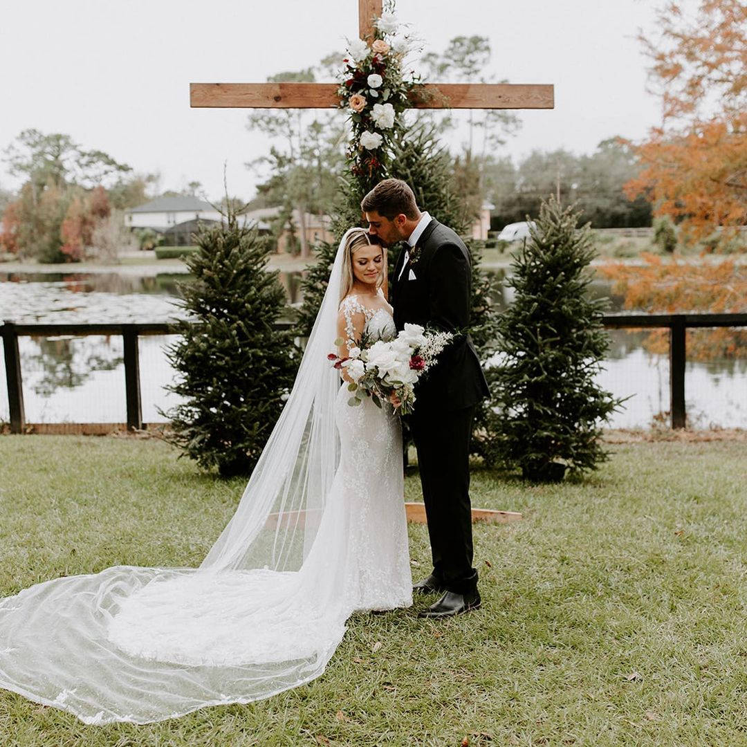 Zach Eflin And Wife At Altar Wallpaper