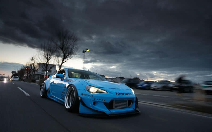 4k Toyota 86 Blue Car Drive Dark Clouds Wallpaper