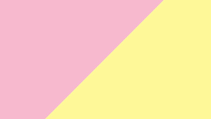 A Beautiful Pastel Pink And Yellow Sunset In The Sky Wallpaper