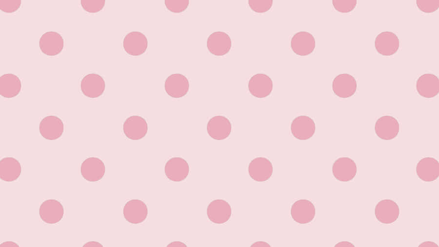 A Beautiful Pattern Of Pink And White Polka Dots. Wallpaper
