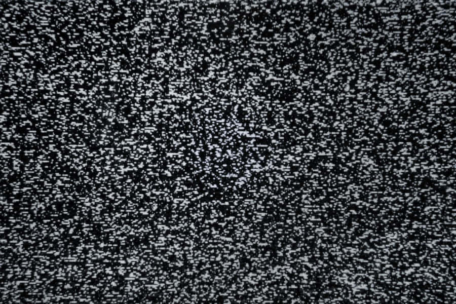 A Black And White Background With A Lot Of Small White Dots Wallpaper