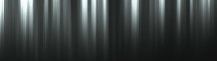 A Black And White Background With Light Streaks Wallpaper