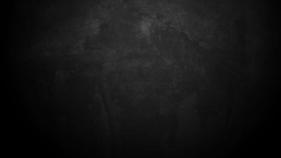 A Black And White Image Of A Black Wall Wallpaper