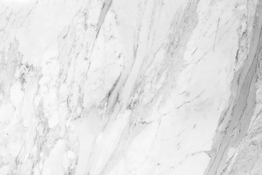 A Black And White Photo Of A Marble Wall Wallpaper
