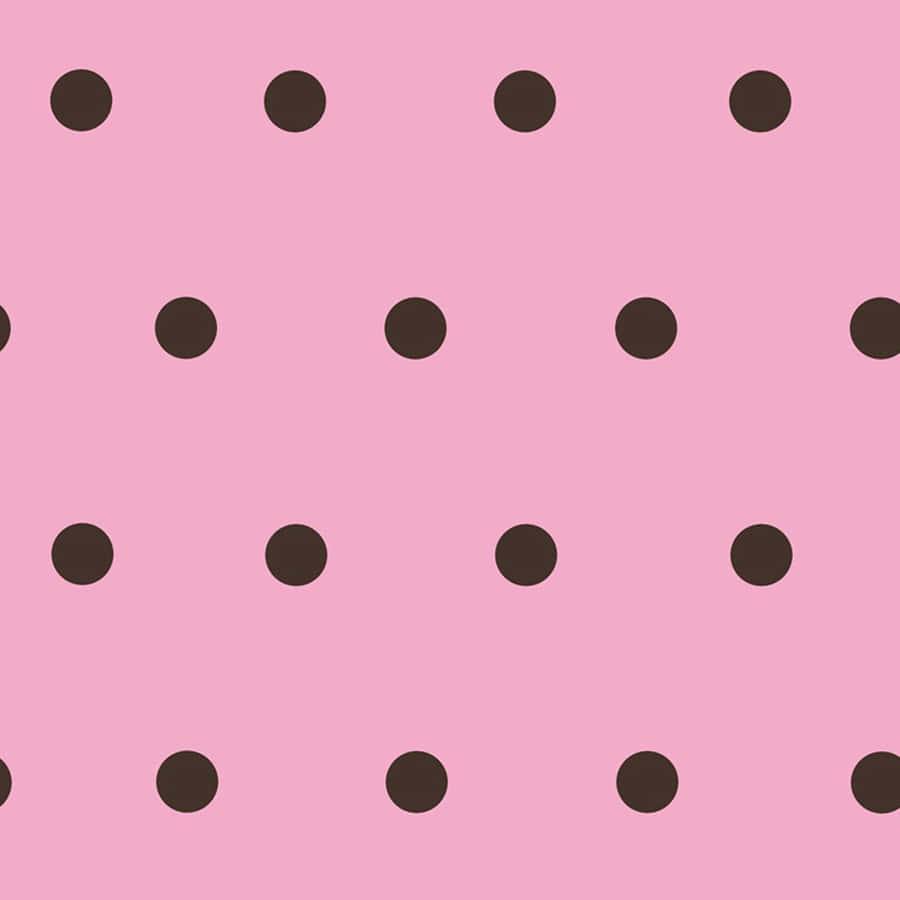 A Cozy And Cute Pink And White Polka Dot Background Wallpaper