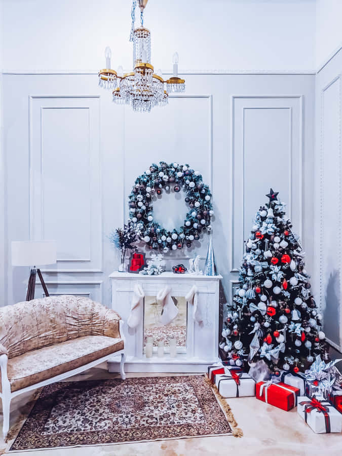 A Festive Aesthetic Christmas Tree With Presents At The Foot Wallpaper