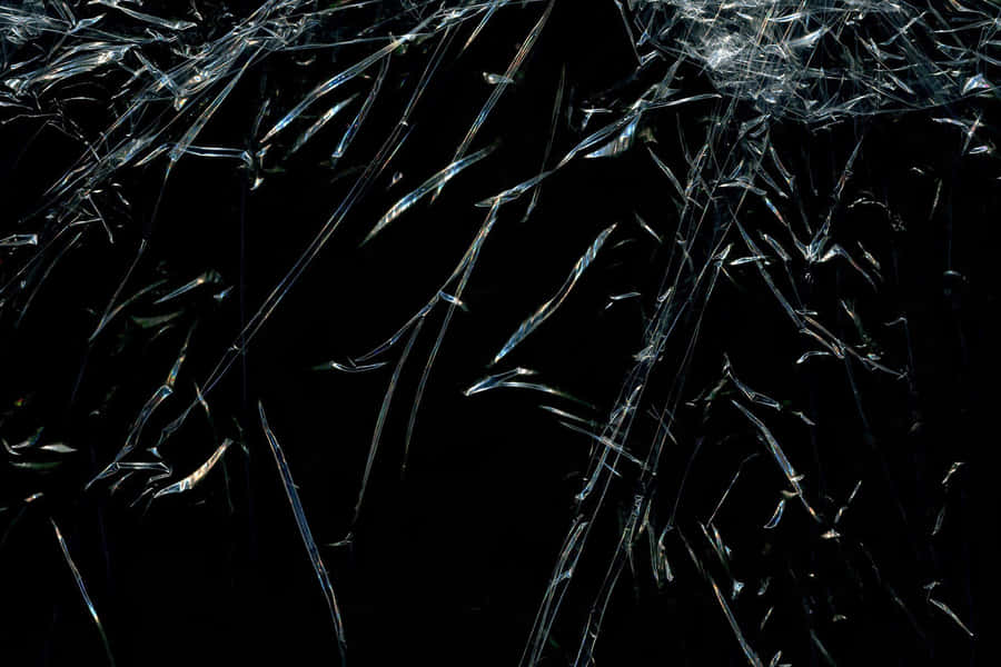 A Glass Window With A Broken Glass Wallpaper