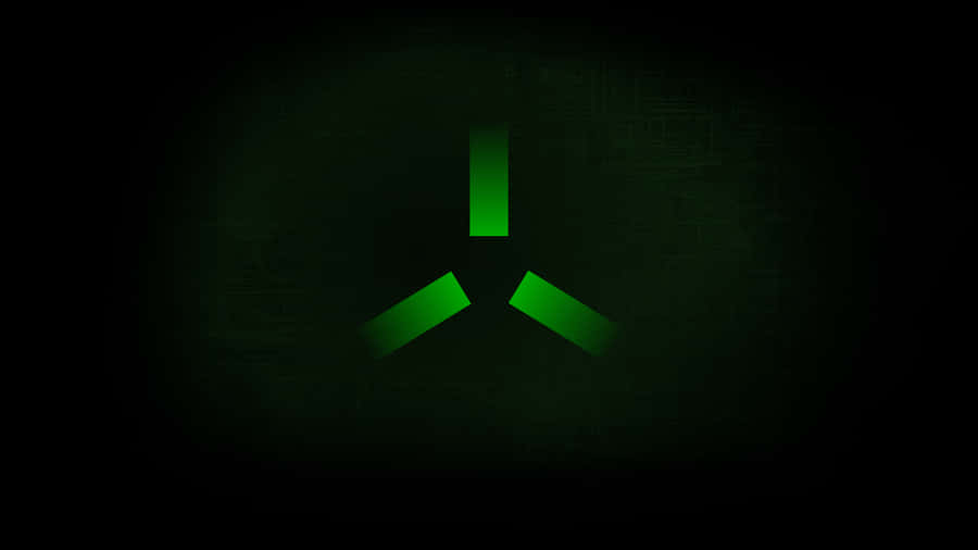 A Green Logo On A Dark Background Wallpaper