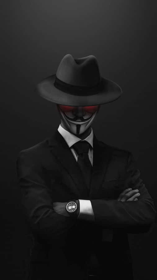 A Man In A Suit And Hat Wallpaper