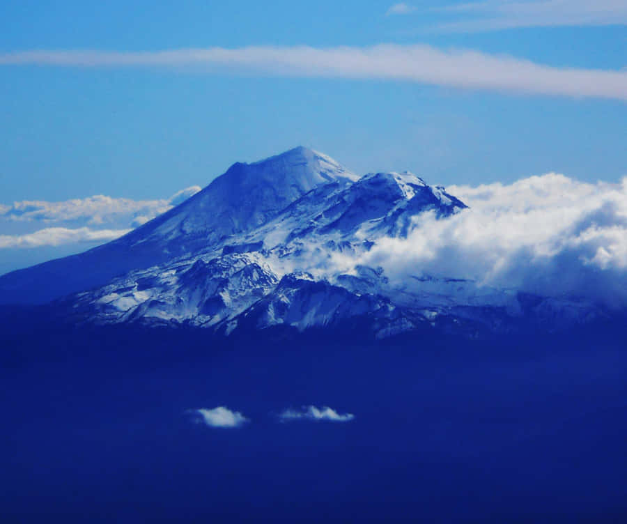 A Mountain With Snow On It Wallpaper