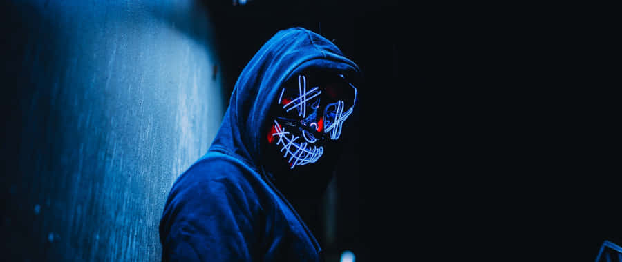 A Mysterious Dark Desktop With Glow Outlined Objects Wallpaper