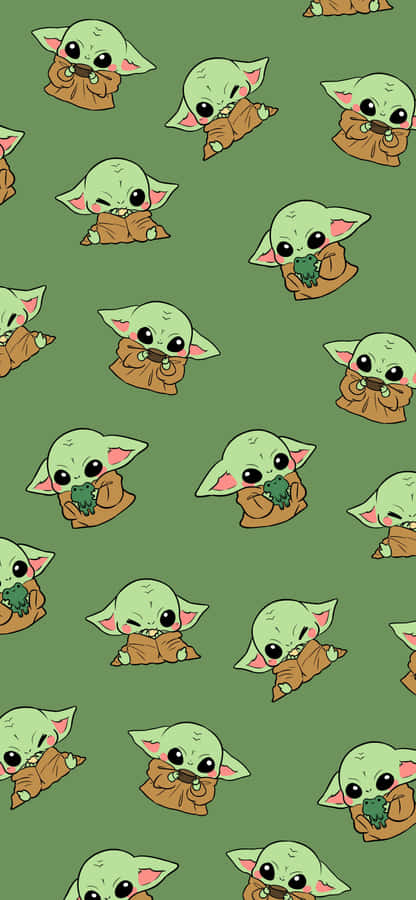 A Pattern Of Baby Yoda On A Green Background Wallpaper
