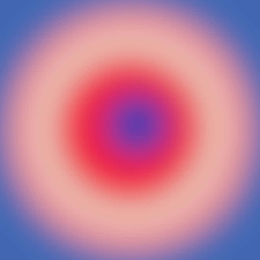 A Pink And Blue Circle With A Blue Background Wallpaper