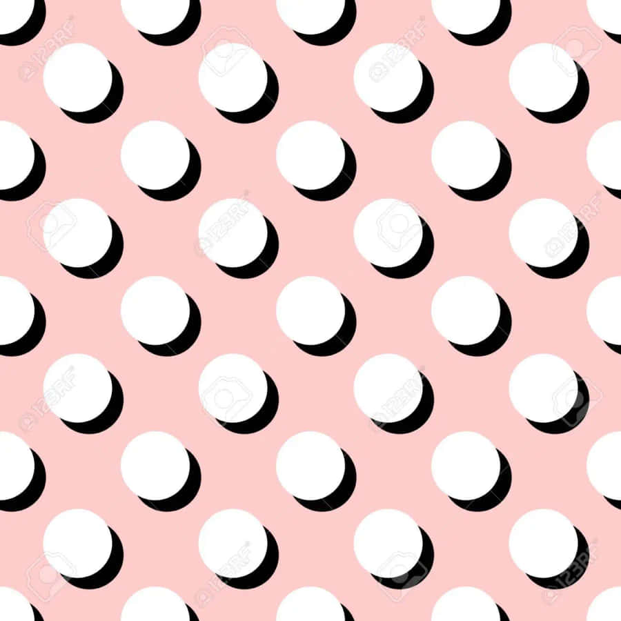 A Pink Background With Black And White Circles Wallpaper