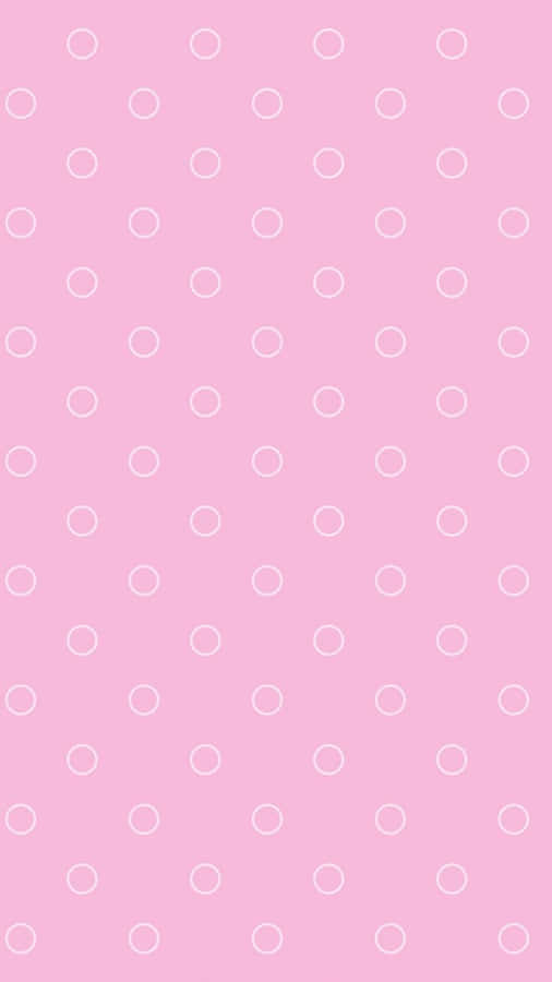 A Pink Background With White Circles Wallpaper