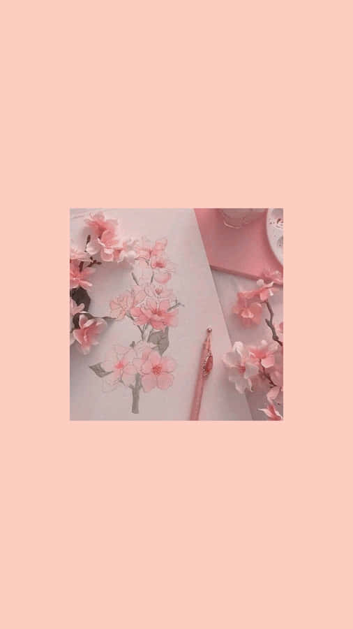 A Pink Flower With A Pen And Paper Wallpaper