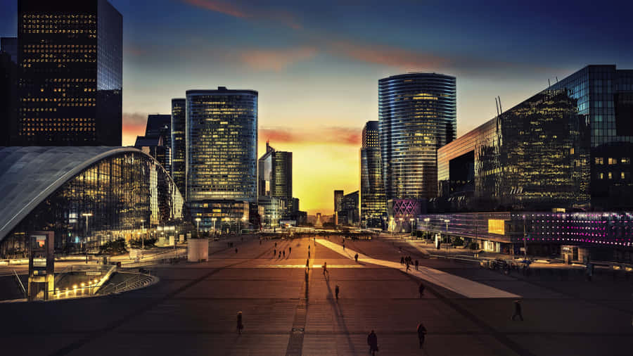 A Romantic Stroll Through Paris At Night Wallpaper
