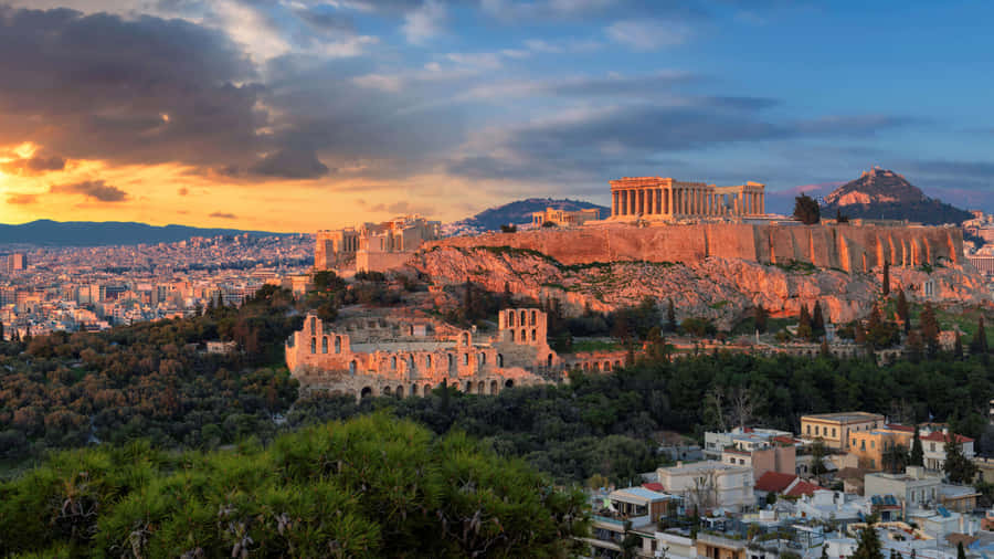 Acropolis Surrounded By Trees At The Base Wallpaper