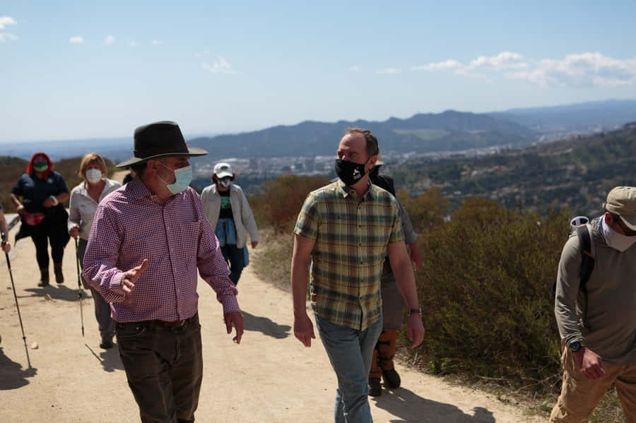 Adam Schiff Hiking With His Crew Wallpaper
