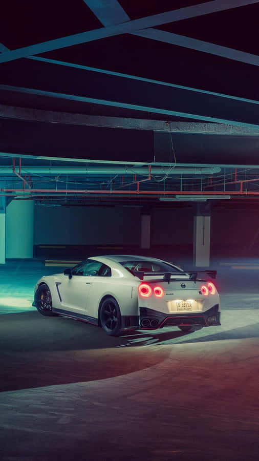 Add A Touch Of Nature To Your Phone With The Nissan Skyline Wallpaper