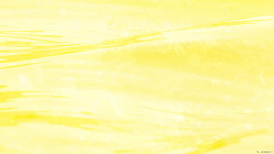 Add Some Brightness To Your Day With This Cheery Pastel Yellow Laptop! Wallpaper