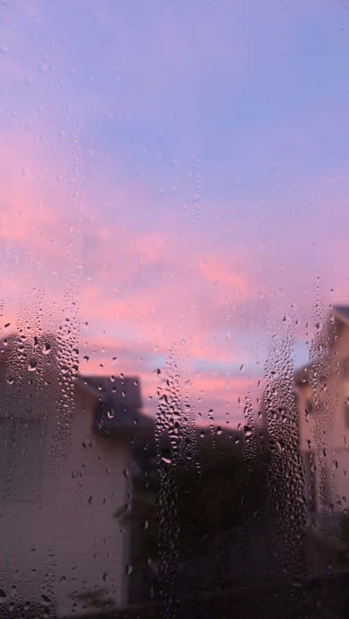 Aesthetic Rain And Purple-pink Skies Wallpaper