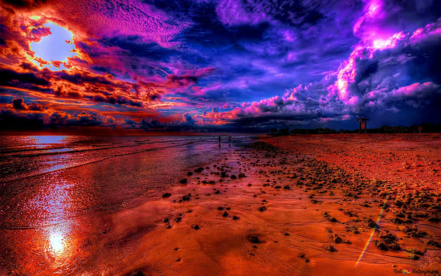 An Idyllic Sky Over An Untouched Beach. Wallpaper