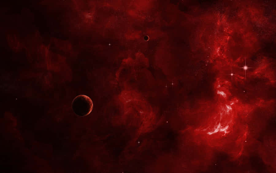 An Illuminated Silhouette Of A Red-hued Gas Giant Against A Bright Field Of Stars Wallpaper