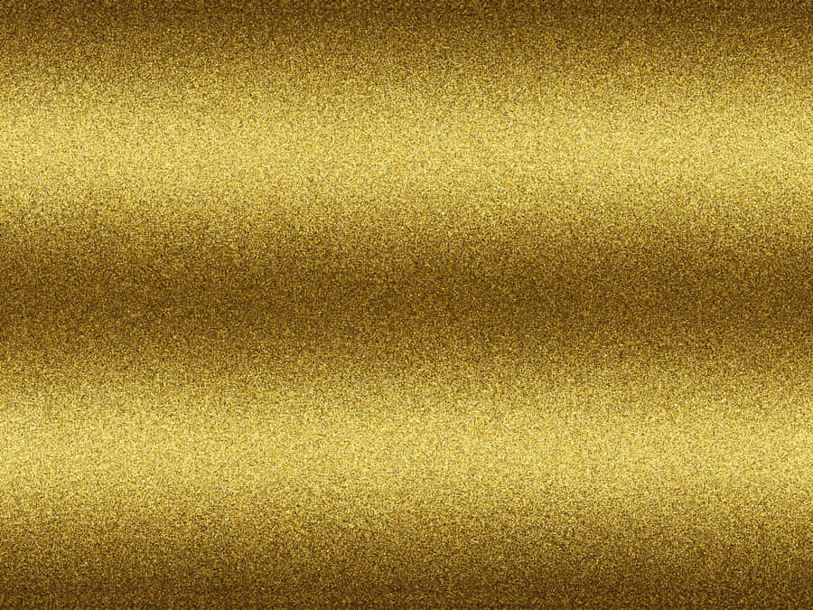 An Image Of A Metallic Gold Surface Wallpaper