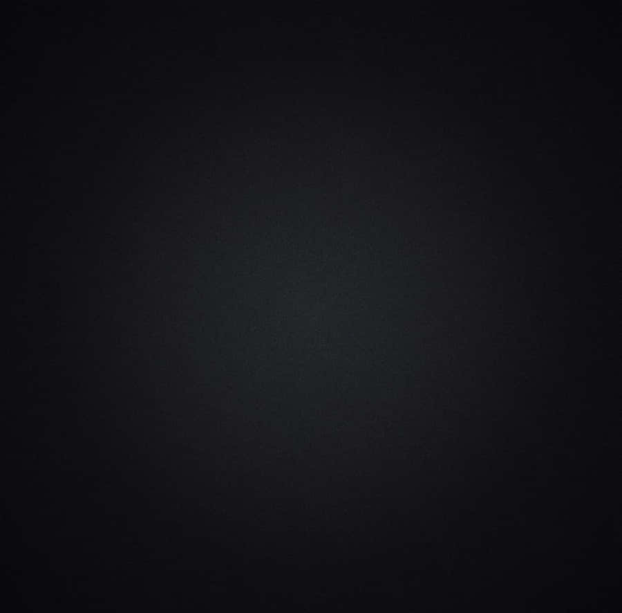 An Ipad With Dark Mode Enabled Wallpaper