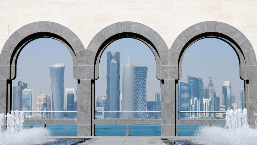 Archways Framing City In Museum Of Islamic Art Wallpaper