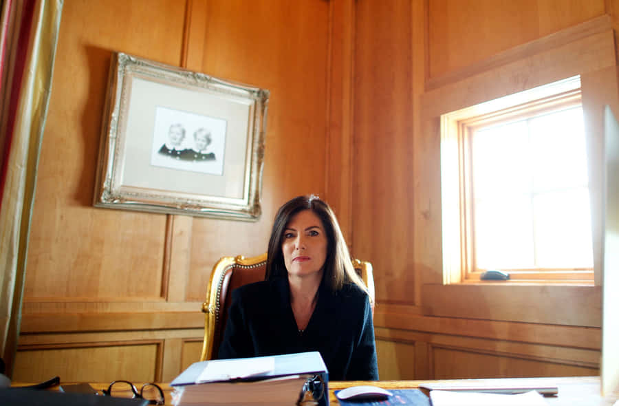 Attorney Working Hard On Client's Case Wallpaper