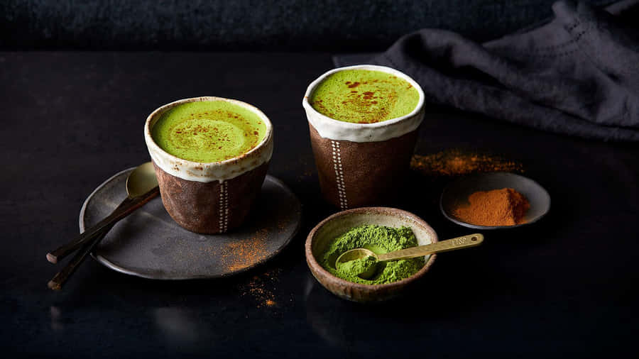 Authentic Green Matcha Tea In Traditional Bowl Wallpaper
