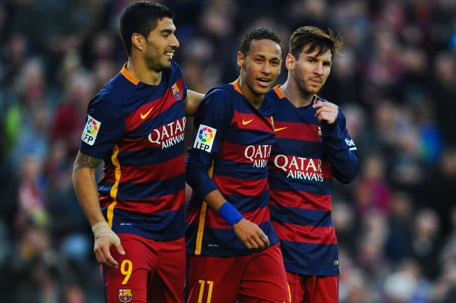 Barcelona Fc Players Celebrate After Scoring A Goal Wallpaper
