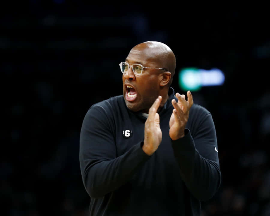 Basketball Coach Expressive Gesture Wallpaper