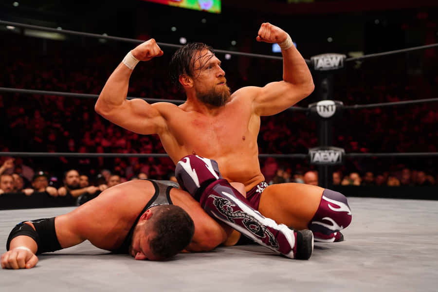 Bryan Danielson Flexing Muscles Wallpaper