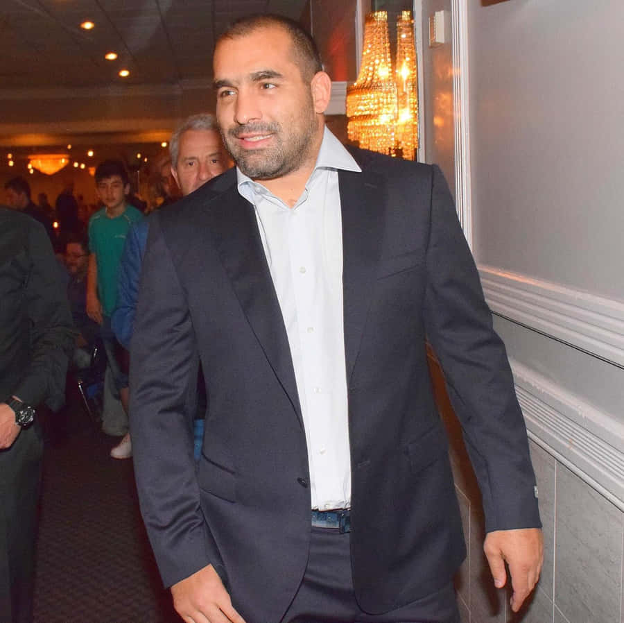 Caption: Blagoy Ivanov - Dressed To Impress In A Classic Suit Wallpaper