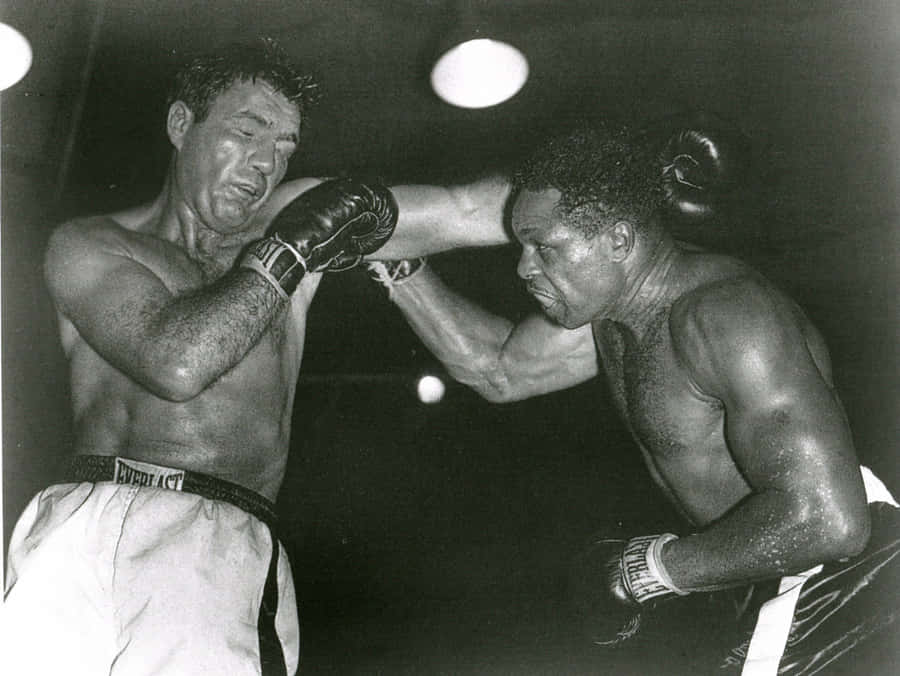 Caption: Joey Maxim Displaying Valor In The Ring Wallpaper