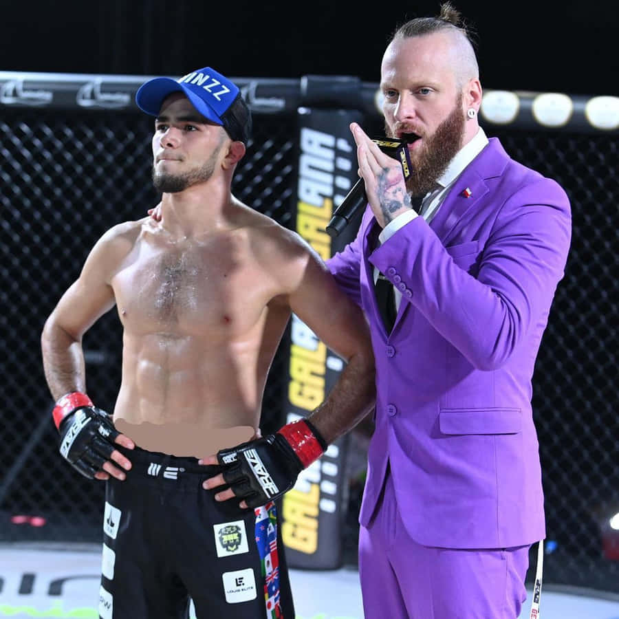 Caption: Mma Fighter Muhammad Mokaev Entering The Stage Wallpaper