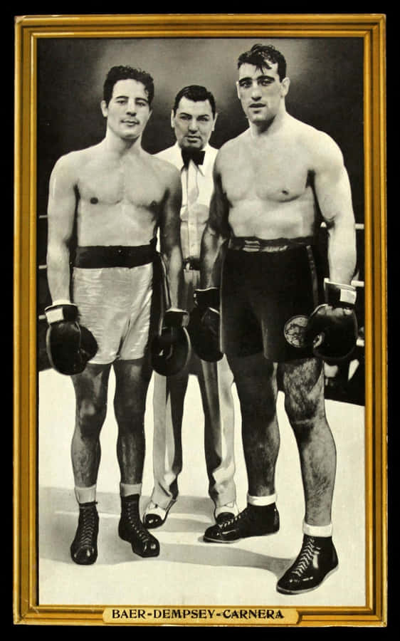Caption: Primo Carnera, Max Baer, And Jack Dempsey At Historic Boxing Event Wallpaper