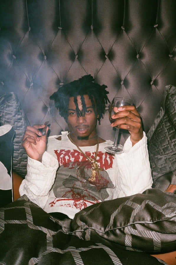 Carti Pfp Smoking In Bed Wallpaper